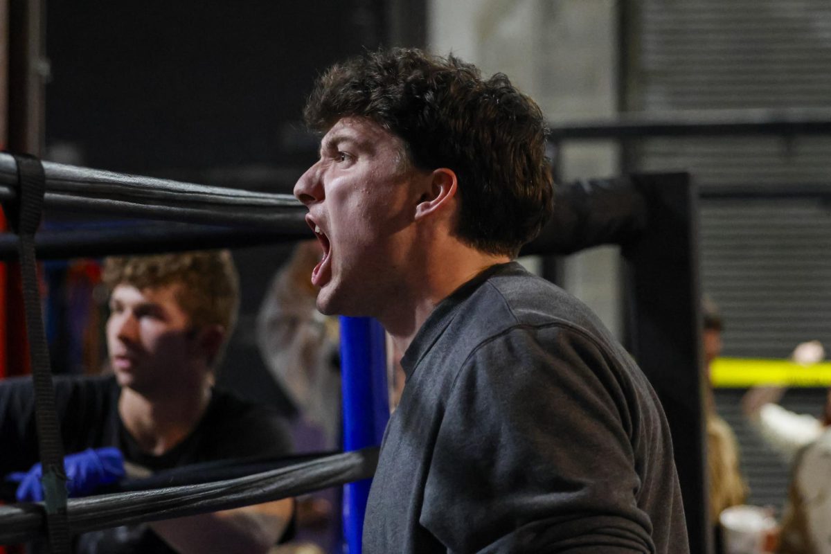 Fan yells after a knockdown during the UK Boxing club exhibition match on Friday, April 12, 2024, at Thrive Tribe Boxing club in Lexington, Kentucky. Photo by Matthew Mueller | Staff