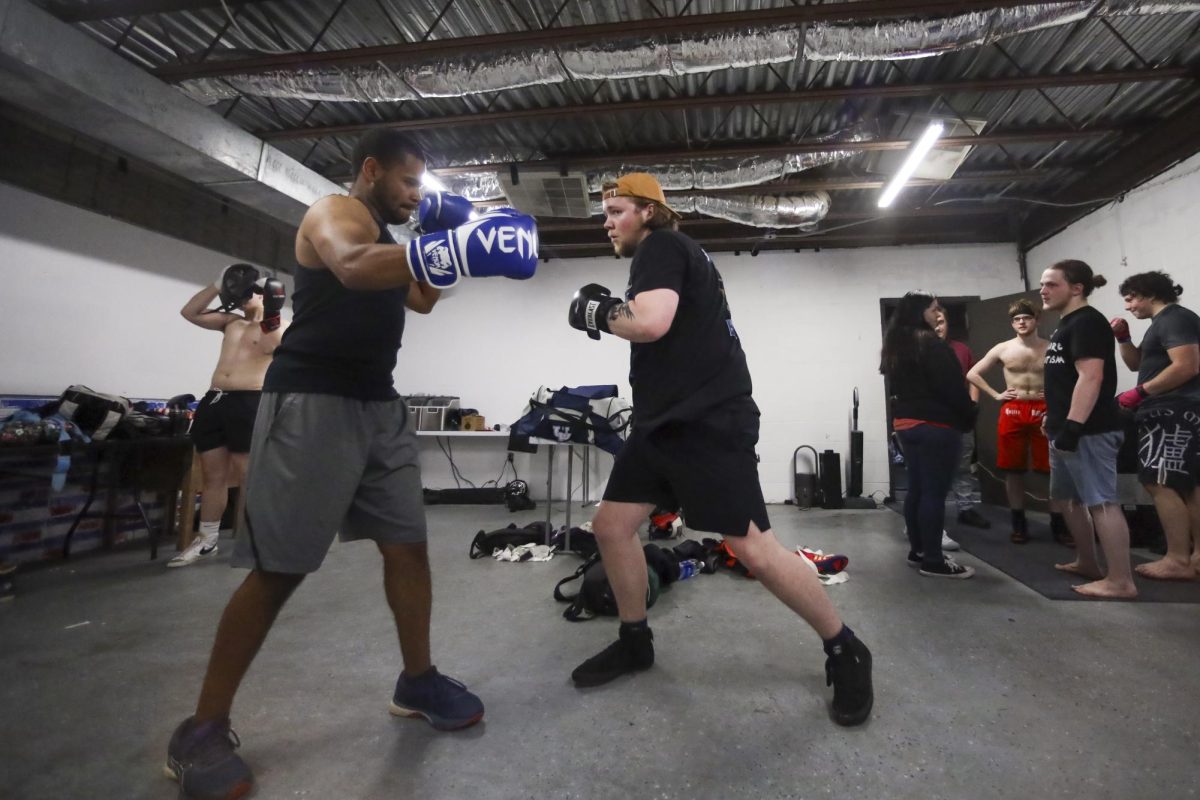 Participants warm up before their match during the UK Boxing club exhibition match on Friday, April 12, 2024, at Thrive Tribe Boxing club in Lexington, Kentucky. Photo by Matthew Mueller | Staff