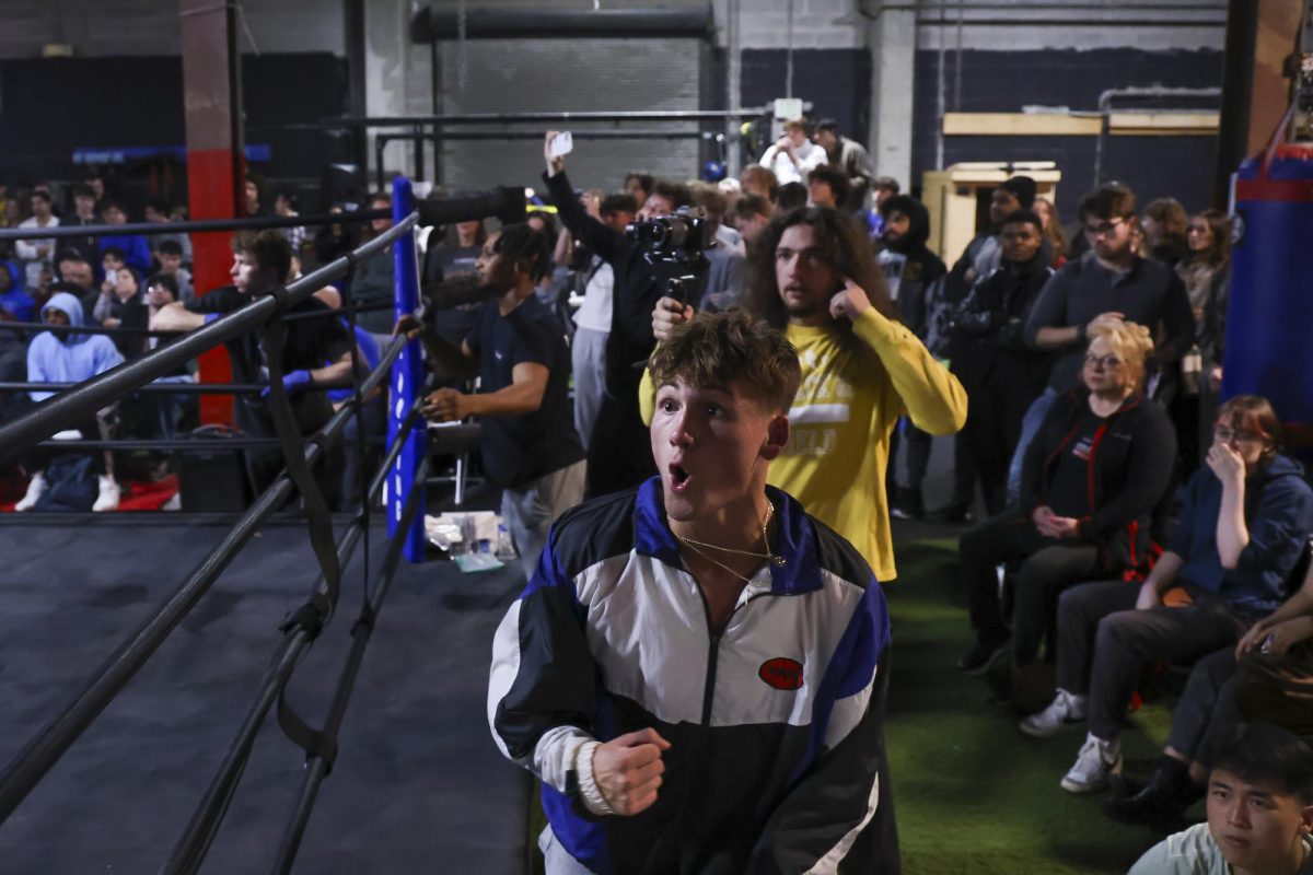 Fan after a punch lands during the UK Boxing club exhibition match on Friday, April 12, 2024, at Thrive Tribe Boxing club in Lexington, Kentucky. Photo by Matthew Mueller | Staff