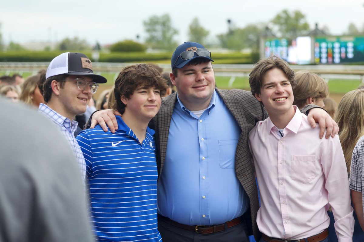 Owen Davis, Thomas Sayers, David Prather and Andrew Schwartz pose for a photo on Friday, April 19, 2024, at Keeneland During College day in Lexington, Kentucky. Photo by Matthew Mueller | Staff