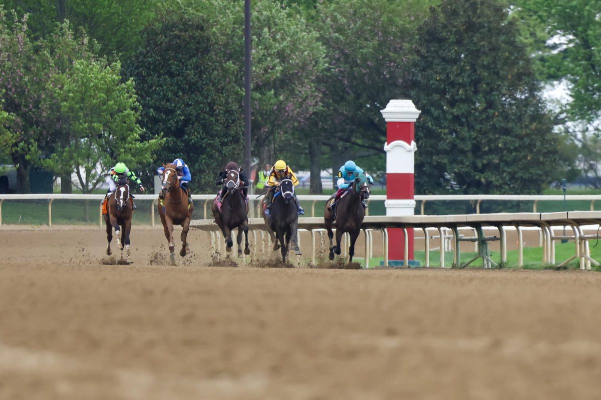 Horses race during the fourth race of the day on Friday, April 19, 2024, at Keeneland During College day in Lexington, Kentucky. Photo by Matthew Mueller | Staff