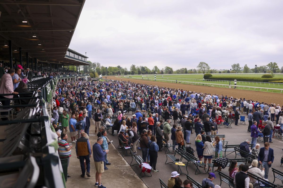 Guests gather for the second race of the day on Friday, April 19, 2024, at Keeneland During College day in Lexington, Kentucky. Photo by Matthew Mueller | Staff