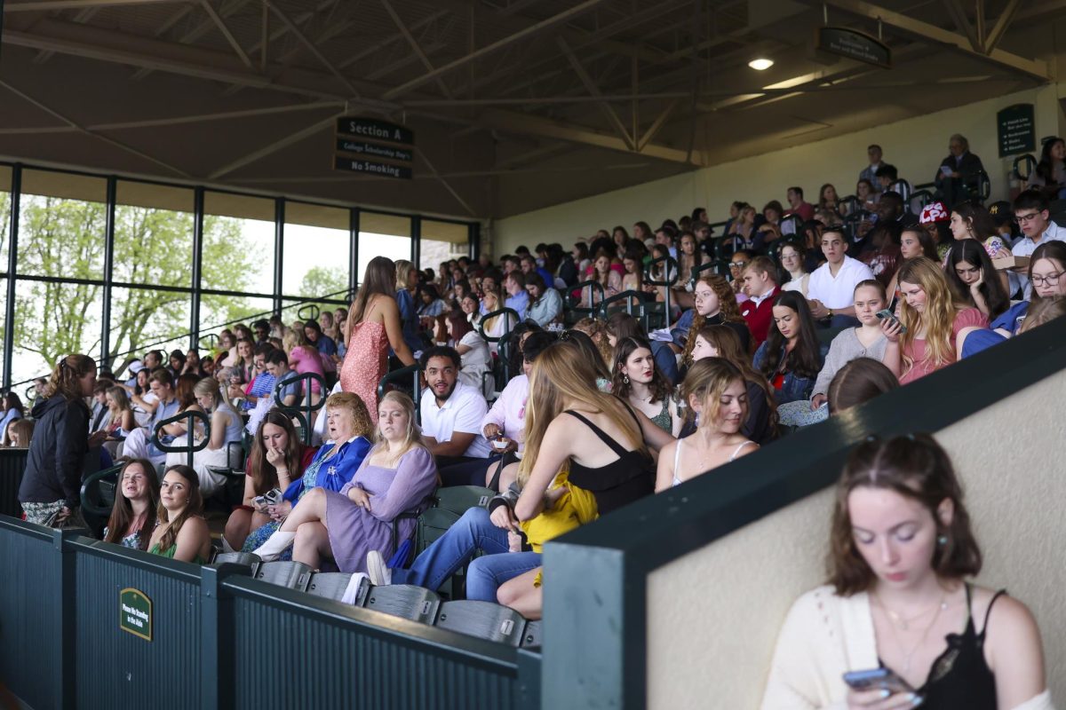 Students fill the stands on Friday, April 19, 2024, at Keeneland During College day in Lexington, Kentucky. Photo by Matthew Mueller | Staff