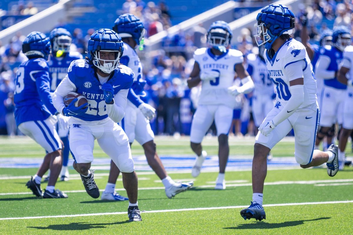 Kentucky running back Jason Patterson (26) runs with the ball during the Kentucky Blue-White Spring football game on Saturday, April 13, 2024, at Kroger Field in Lexington, Kentucky. Photo by Samuel Colmar | Staff
