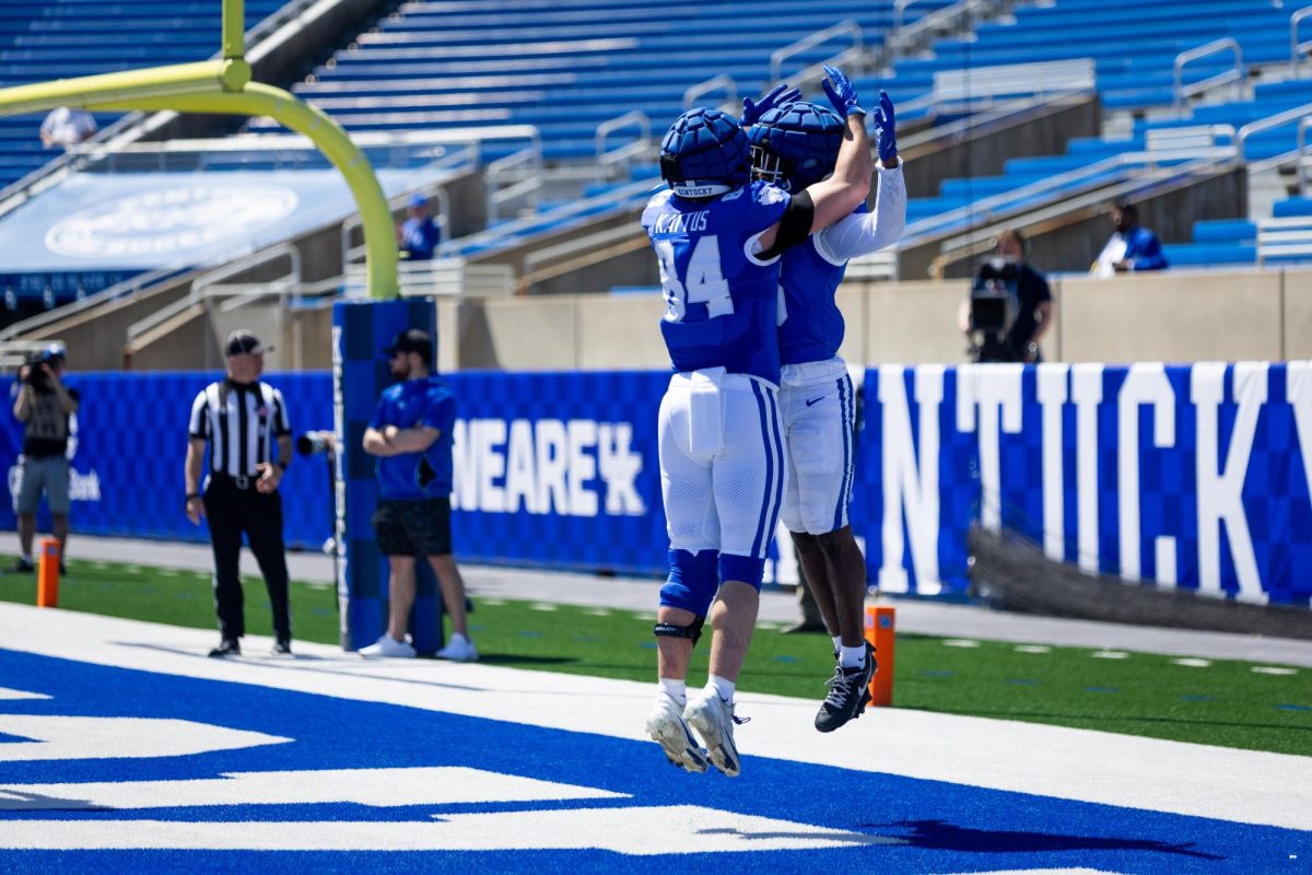 Kentucky players celebrate a touchdown during the Kentucky Blue-White Spring football game on Saturday, April 13, 2024, at Kroger Field in Lexington, Kentucky. Photo by Samuel Colmar | Staff