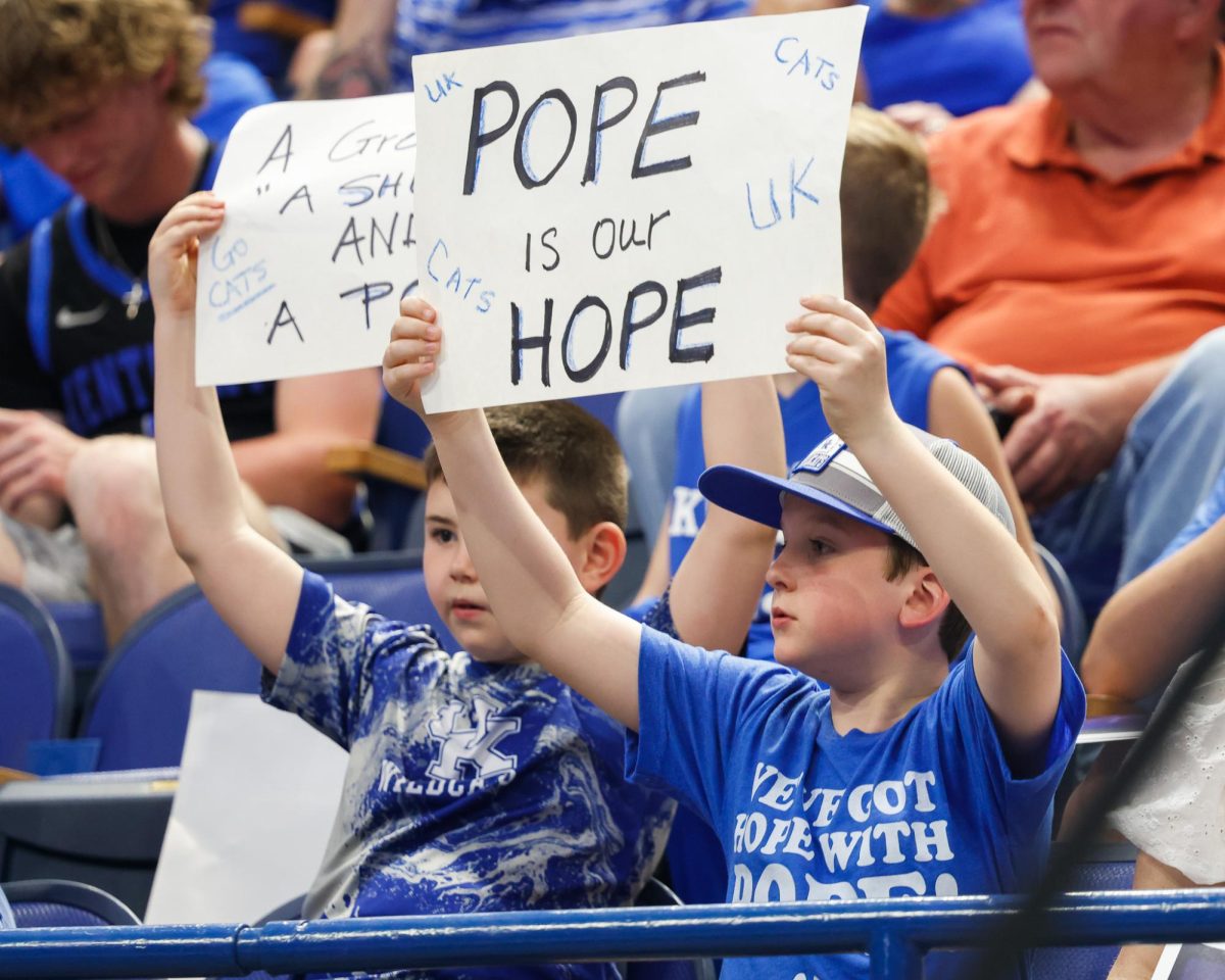 Fans hold up signs before Mark Pope’s introductory press conference as the new head coach of Kentucky men’s basketball on Sunday, April 14, 2024, at Rupp Arena in Lexington, Kentucky. Photo by Abbey Cutrer | Staff