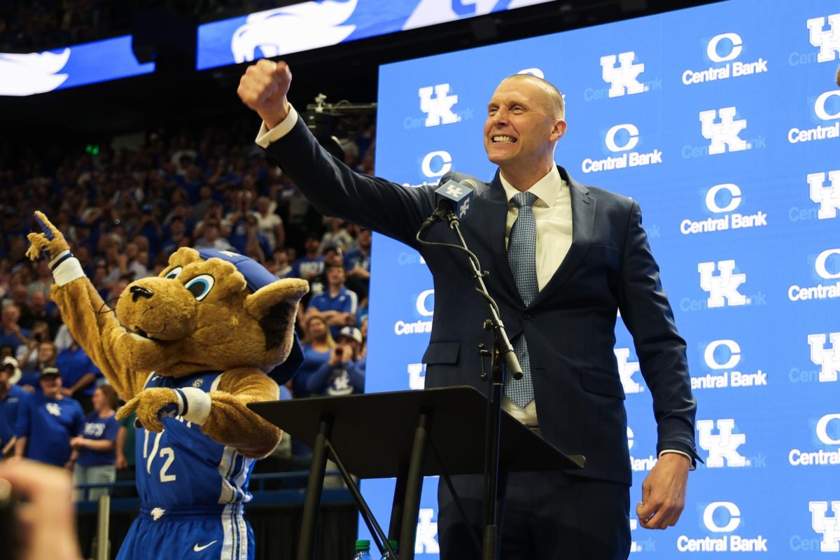 Mark Pope cheers at his introductory press conference as the new head coach of Kentucky men’s basketball on Sunday, April 14, 2024, at Rupp Arena in Lexington, Kentucky. Photo by Abbey Cutrer | Staff