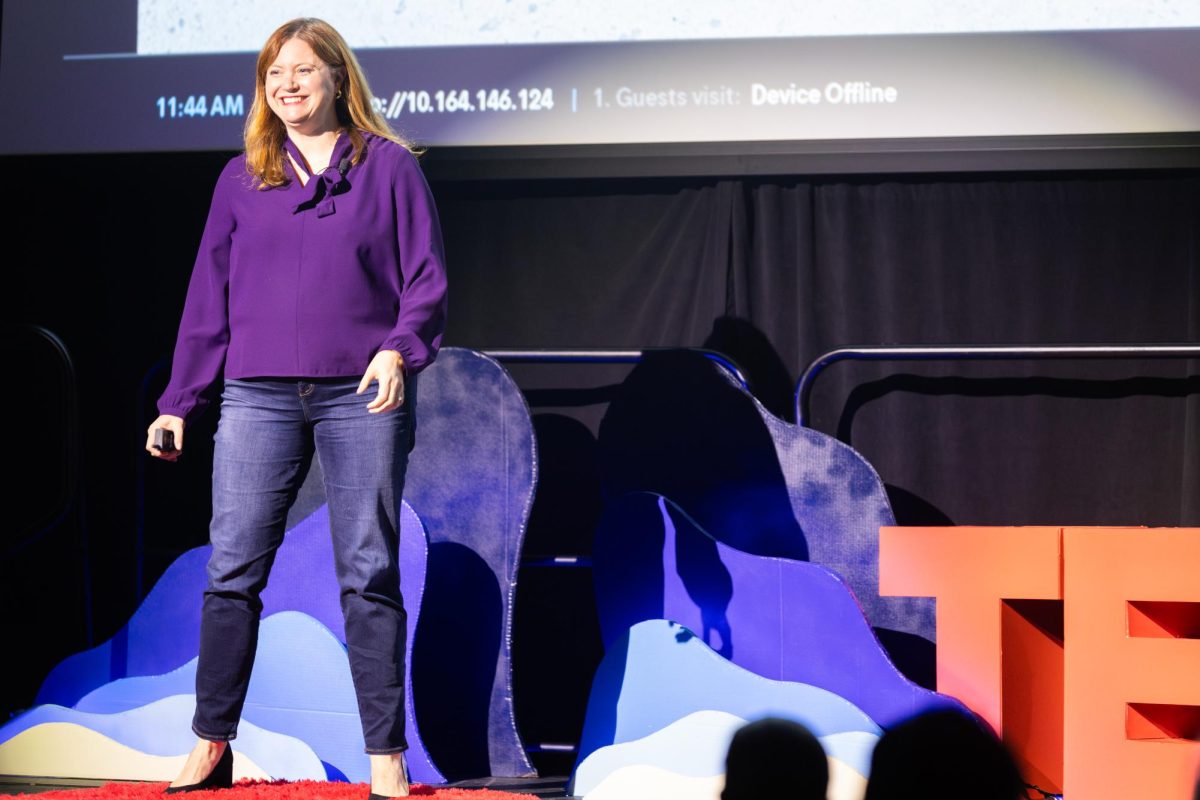 Associate Professor of Clinical Psychology and author Shannon Sauer-Zavala is introduced during the TEDxUKY Trailblazing event on Friday, April 12, 2024, at the Gatton Student Center Grand Ballroom in Lexington, Kentucky. Photo by Samuel Colmar | Staff