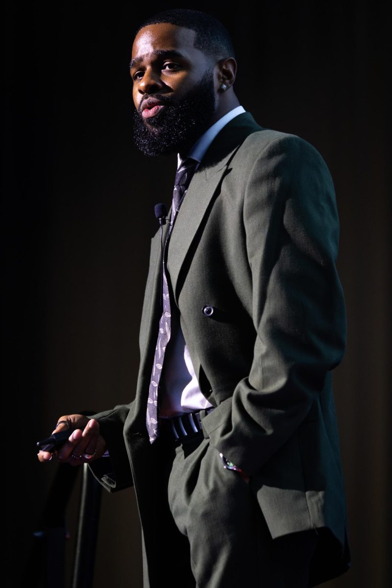 Counseling Psychology Ph.D. candidate Destin Mizelle speaks during the TEDxUKY Trailblazing event on Friday, April 12, 2024, at the Gatton Student Center Grand Ballroom in Lexington, Kentucky. Photo by Samuel Colmar | Staff