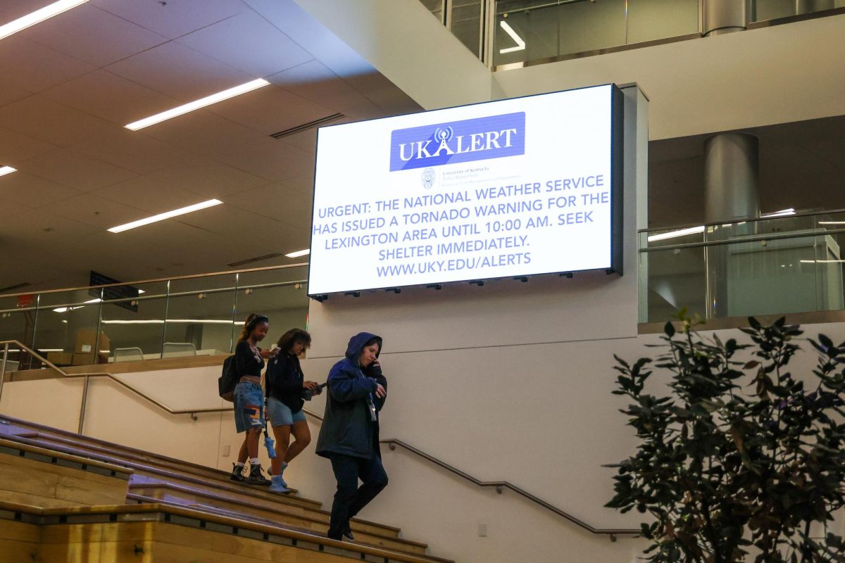 Students walk down the stairs in the Gatton Student Center during a tornado warning on Tuesday, April 2, 2024, at the University of Kentucky in Lexington, Kentucky. Photo by Abbey Cutrer | Staff