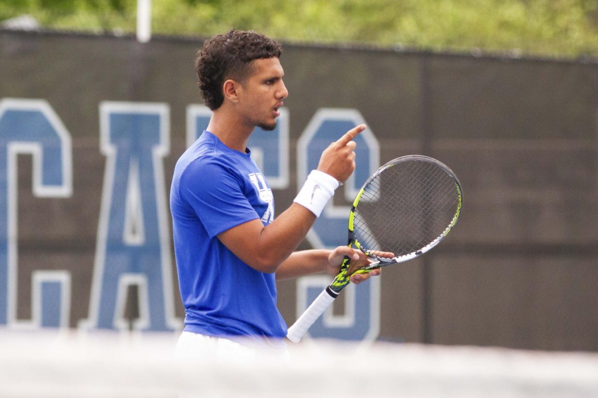Fifth-Year Taha Baadi commends freshman Jack Loutit after they win a point in doubles at the Hillary J. Boone Tennis Facility on Friday, May 3, 2024, in Lexington, Kentucky.