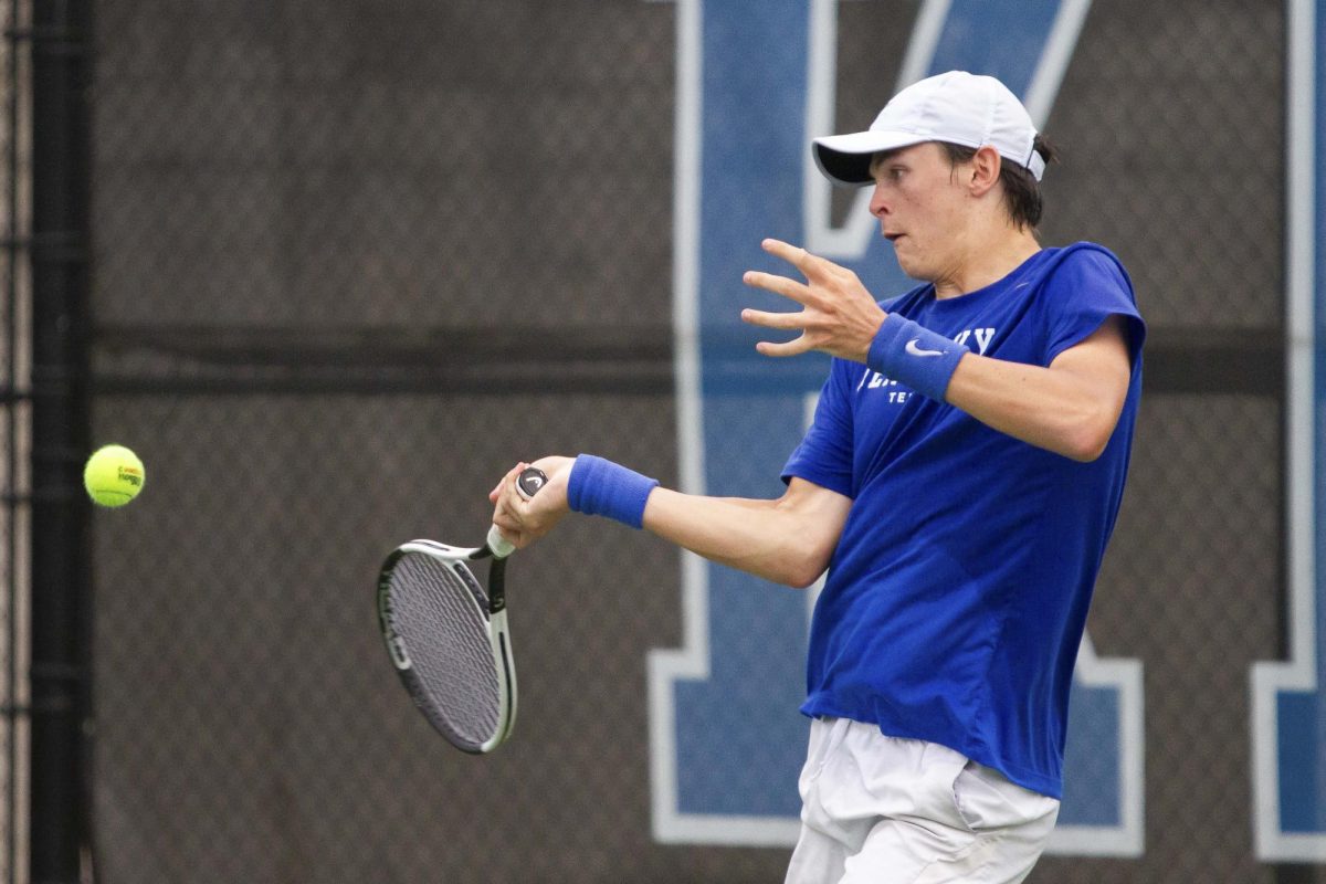 Freshman Eli Stephenson returns a ball at the Hillary J. Boone Tennis Facility on Friday, May 3, 2024, in Lexington, Kentucky. He faces DePauls Moser and wins the first set 6-3 and the second 5-3 which remains unfinished.