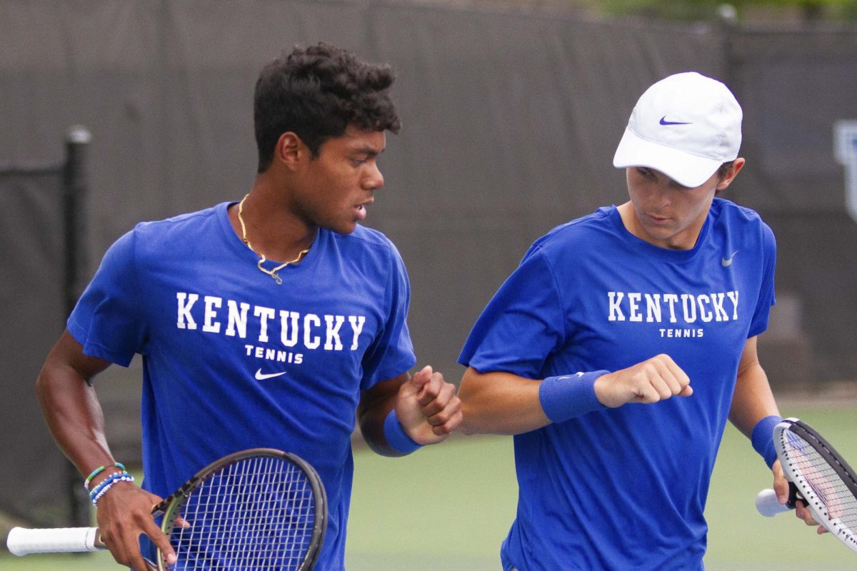 Sophomore Jaden Weekes and freshman Eli Stephenson (left) celebrate a set win at the Hillary J. Boone Tennis Facility on Friday, May 3, 2024, in Lexington, Kentucky.