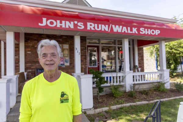 Mike Acord, 71, poses for a portrait outside of John’s Walk Run Shop on Tuesday, June 11, 2024, at University of Kentucky in Lexington, Kentucky. Photo by Matthew Mueller | Staff