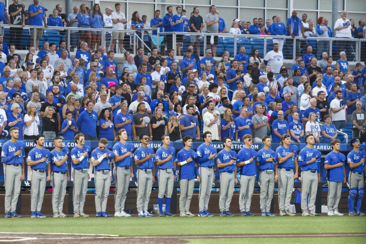 Kentucky players stand for the Pledge of Allegiance. Kentucky beat Oregon State 3-2 to win the Lexington Super Regional and advance to the 2024 College World Series on Sunday, June 9, 2024, at Kentucky Proud Park in Lexington, Kentucky. Photo by Cole Parke | Staff