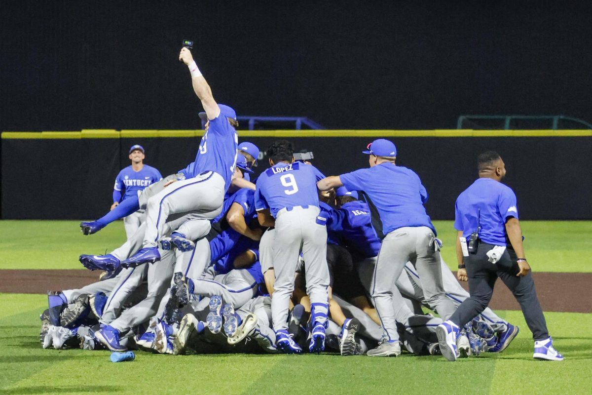 Kentucky players dog pile after winning their game against Oregon State letting them advance to the College World Series. Kentucky beat Oregon State 3-2 to win the Lexington Super Regional and advance to the 2024 College World Series on Monday, June 10, 2024, at Kentucky Proud Park in Lexington, Kentucky. Photo by Cole Parke | Staff