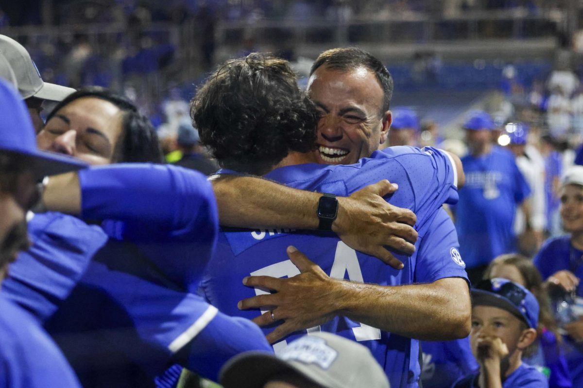 Kentucky Head Coach Nick Mingione hugs outfielder Eli Small after Kentucky’s victory over Oregon State. Kentucky beat Oregon State 3-2 to win the Lexington Super Regional and advance to the 2024 College World Series on Monday, June 10, 2024, at Kentucky Proud Park in Lexington, Kentucky. Photo by Cole Parke | Staff