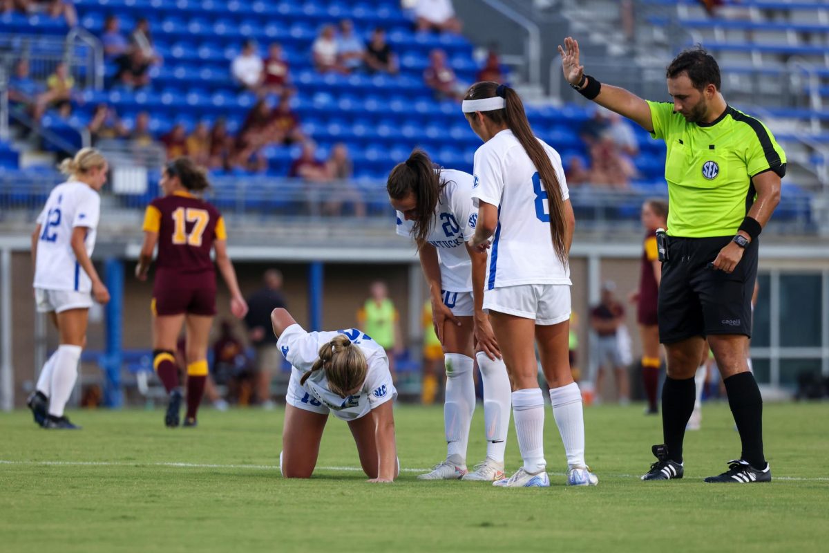 Kentucky midfielder Mallory Glass takes a hit during the Kentucky vs. Central Michigan women’s soccer game on Thursday, Aug. 15, 2024, at Wendell and Vickie Bell Soccer Complex in Lexington, Kentucky. Kentucky won 2-0. Photo by Sydney Yonker | Staff
