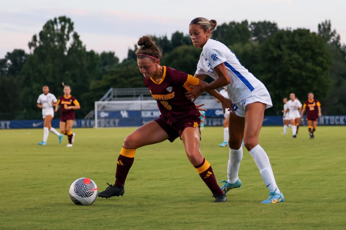 Kentucky midfielder Tanner Strickland fights for the ball during the Kentucky vs. Central Michigan women’s soccer game on Thursday, Aug. 15, 2024, at Wendell and Vickie Bell Soccer Complex in Lexington, Kentucky. Kentucky won 2-0. Photo by Sydney Yonker | Staff
