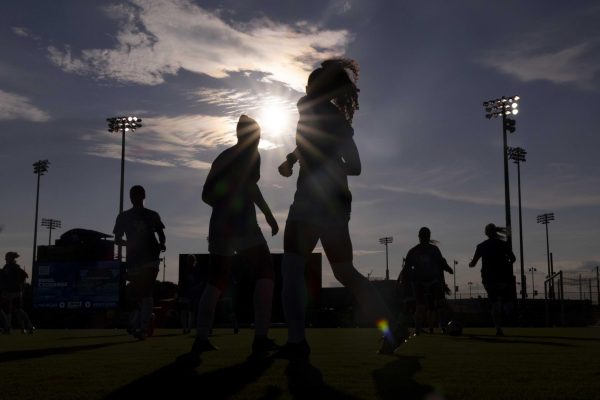 Kentucky players warm up on the pitch before the start of the match during the Kentucky vs. Central Michigan women’s soccer game on Thursday, Aug. 15, 2024, at Wendell and Vickie Bell Soccer Complex in Lexington, Kentucky. Kentucky won 2-0. Photo by Matthew Mueller | Photo Editor 