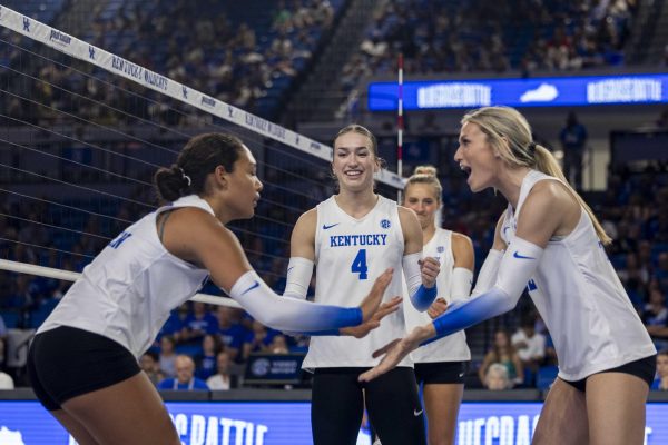 Kentucky Volleyball celebrates after a point on Friday, Aug. 30, 2024, at Memorial Coliseum in Lexington, Kentucky. Kentucky beat NKU 3-0. Photo by Matthew Mueller | Photo editor 
