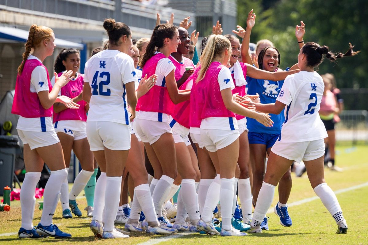 The Kentucky bench celebrates the second goal by Kentucky midfielder/forward Maddie Kemp (2) during the Kentucky vs. Jacksonville State women's soccer game on Sunday, Aug. 25, 2024, at the Wendell and Vickie Bell Soccer Complex in Lexington, Kentucky.  Kentucky won 4-1. Photo by Samuel Colmar | Staff