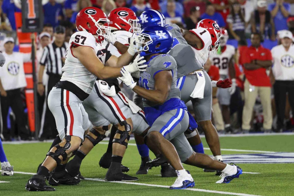 Kentucky Wildcats and Georgia Bulldogs linemen push each other during the game between Kentucky and Georgia on Saturday, Sept. 14, 2024, at Kroger Field in Lexington, Kentucky. Kentucky lost to Georgia 13-12. Photo by Sydney Yonker | Staff