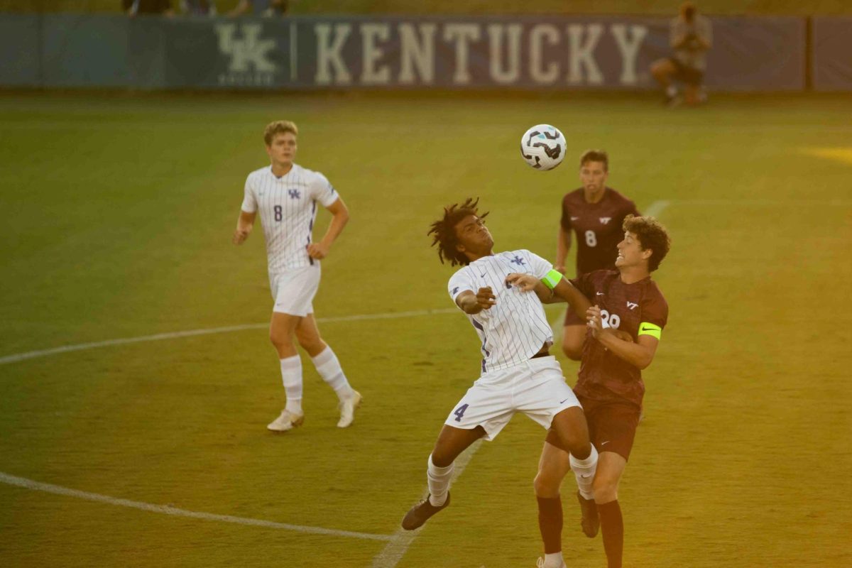 Defender, Marqes Muir goes up for a header in the Kentucky Men's Soccer game vs. Virginia Tech at the Wendell and Vickie Bell Soccer Complex on Monday, Sep. 2, 2024, in Lexington, Kentucky. The teams tied 2-2. Photo by Christian Kantosky | Staff