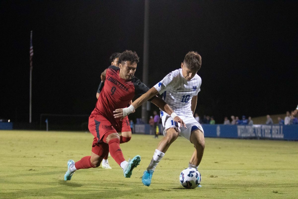 Midfielder, Agustin Lopez shields the bal in the Kentucky vs Louisville match on Monday, Sept. 9, 2024, at the Wendell and Vickie Bell Soccer Complex in Lexington, Kentucky. Kentucky lost 1-0. Photo by Christian Kantosky | Staff