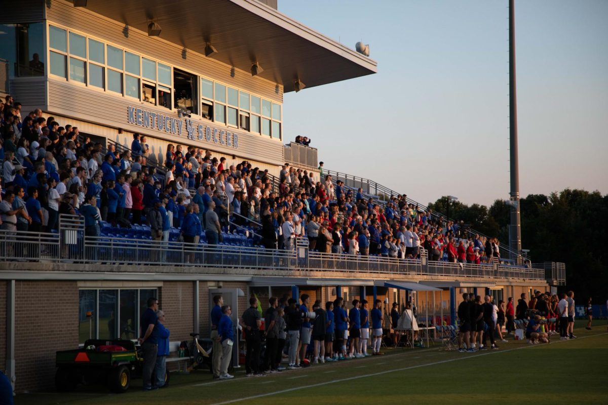 Fans stand for the national anthem before kickoff at the Kentucky vs Louisville match on Monday, Sept. 9, 2024, at the Wendell and Vickie Bell Soccer Complex in Lexington, Kentucky. Kentucky lost 1-0. Photo by Christian Kantosky | Staff