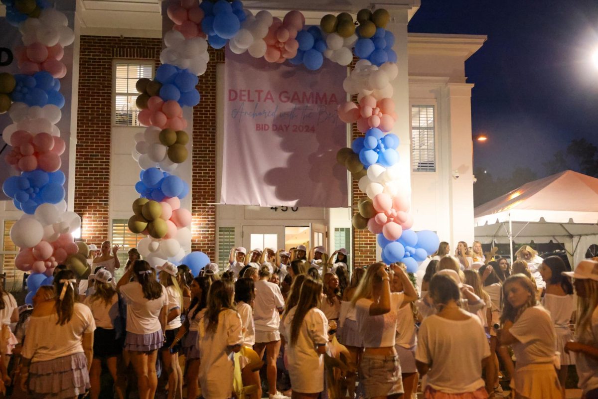 Members of Delta Gamma celebrate their new members during the Kentucky sorority Bid Day on Monday, Sept. 9, 2024, at Greek Row in Lexington, Kentucky. Photos by | Sydney Yonker | Staff