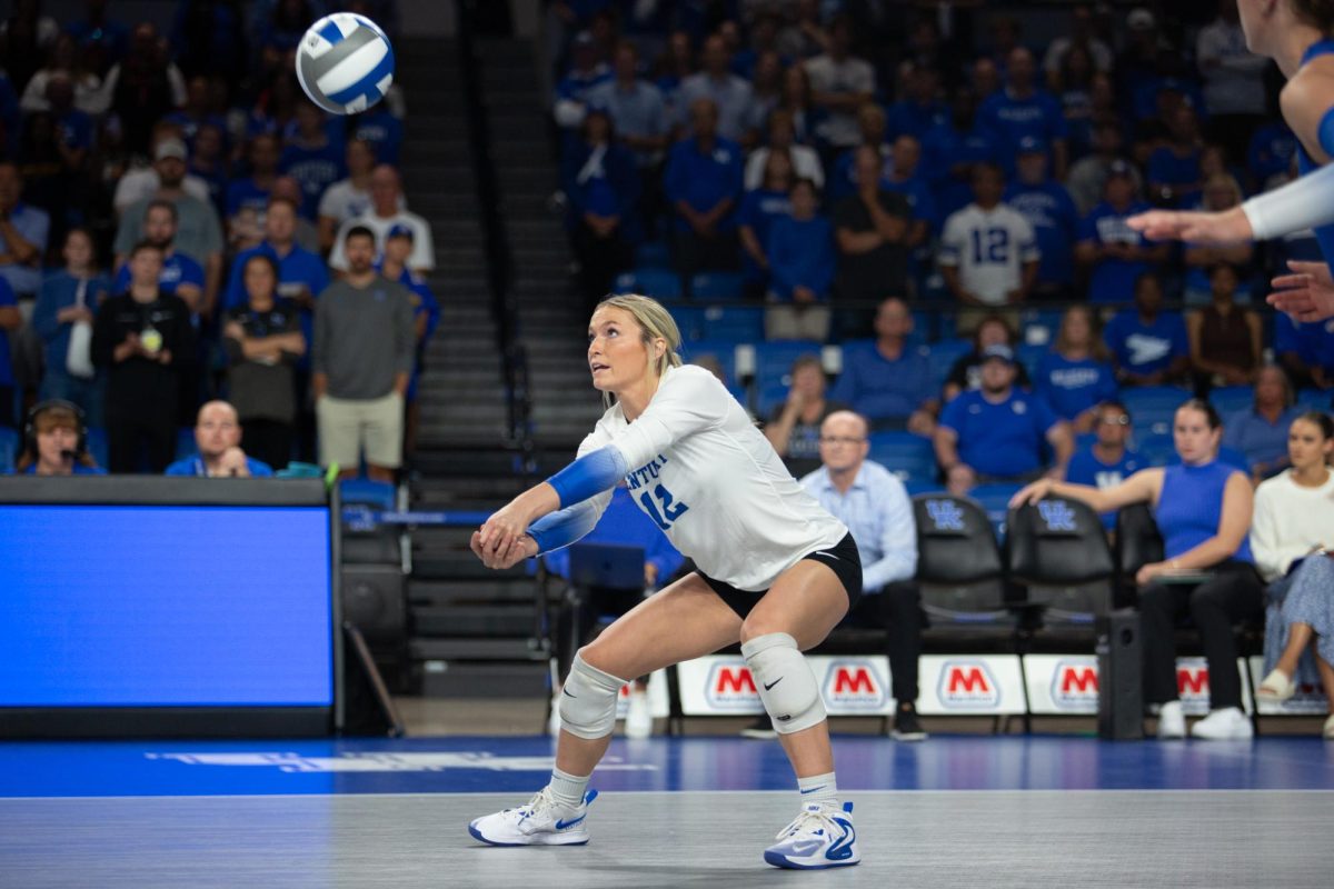 Kentucky libero (12) Molly Tuozzo passes the ball during the Kentucky vs. Louisville volleyball game on Wednesday, Sept. 18, 2024, at Memorial Coliseum in Lexington, Kentucky. Kentucky lost 3-1. Photo by Sydney Novack | Staff