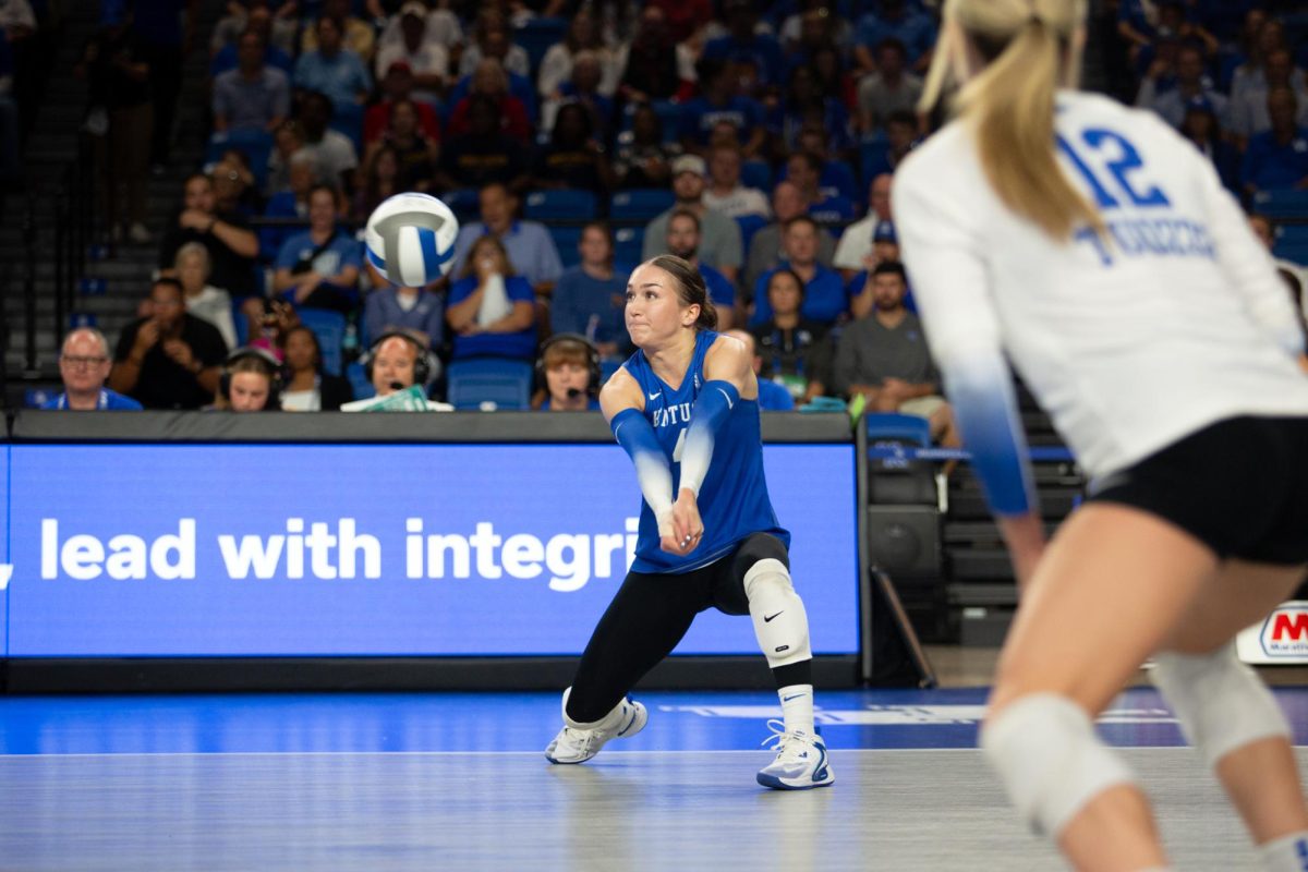 Kentucky Setter (4) Emma Grome passes the ball during the Kentucky vs Louisville volleyball game on Wednesday, Sept. 18, 2024, at Memorial Coliseum in Lexington, Kentucky. Kentucky lost 3-1. Photo by Sydney Novack | Staff