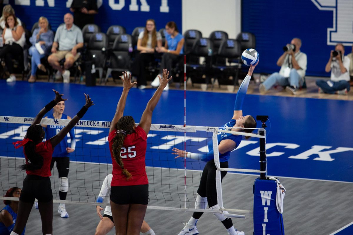 Kentucky outside hitter (17) Brooklyn DeLeye tips the ball during the Kentucky vs. Louisville volleyball game on Wednesday, Sept. 18, 2024, at Memorial Coliseum in Lexington, Kentucky. Kentucky lost 3-1. Photo by Sydney Novack | Staff