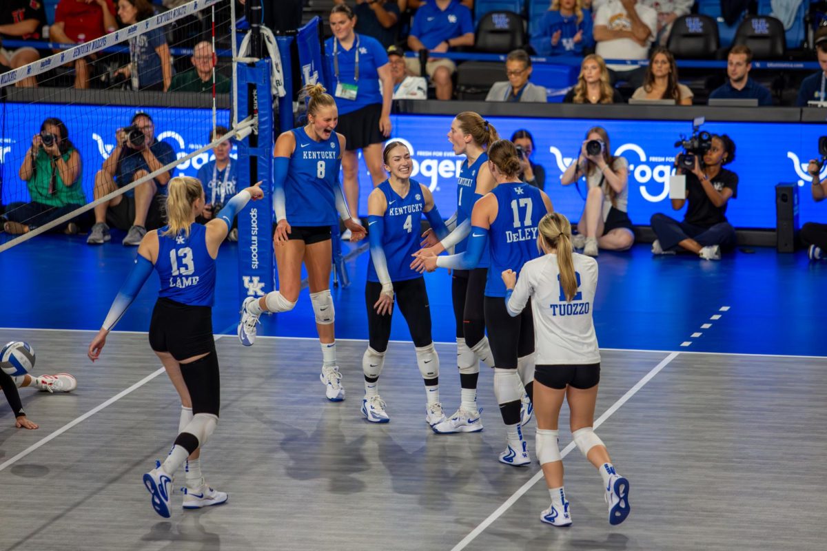 Kentucky celebrates a point during the Kentucky vs. Louisville volleyball game on Wednesday, Sept. 18, 2024, at Memorial Coliseum in Lexington, Kentucky. Kentucky lost 3-1. Photo by Sydney Novack | Staff