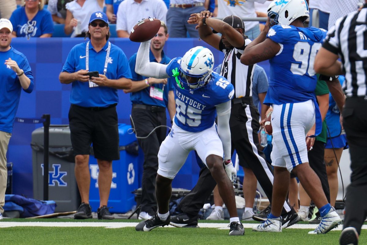 Kentucky Wildcats defensive back Jordan Lovett (25) throws the ball down in celebration during the Kentucky vs. Ohio University Football game on Saturday, Sept. 21, 2024, at Kroger Field in Lexington, Kentucky. Photo by Sydney Yonker | Staff