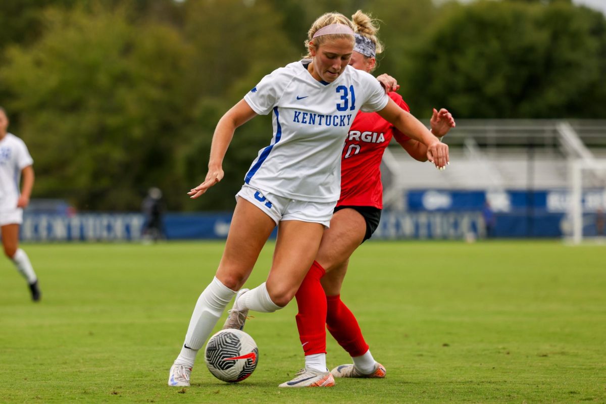 Kentucky forward Alexis Tylenda fights for the ball during the Kentucky vs Georgia Women’s Soccer game on Thursday, Sept. 26, 2024, at Kroger Field in Lexington, Kentucky. Kentucky tied 1-1. Photo by Sydney Yonker | Staff