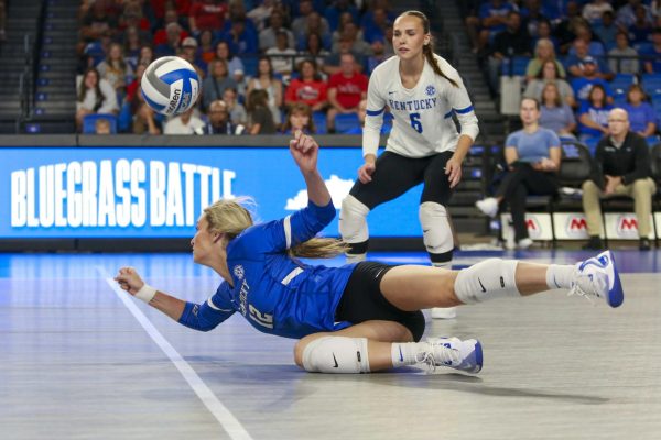 Kentucky’s Molly Tuozzo (12) dives to save the ball on Saturday, Aug. 31, 2024, at the Historic Memorial Coliseum in Lexington, Kentucky. Kentucky defeated Morehead 3-0 Photo by Isabella Sepahban | Staff