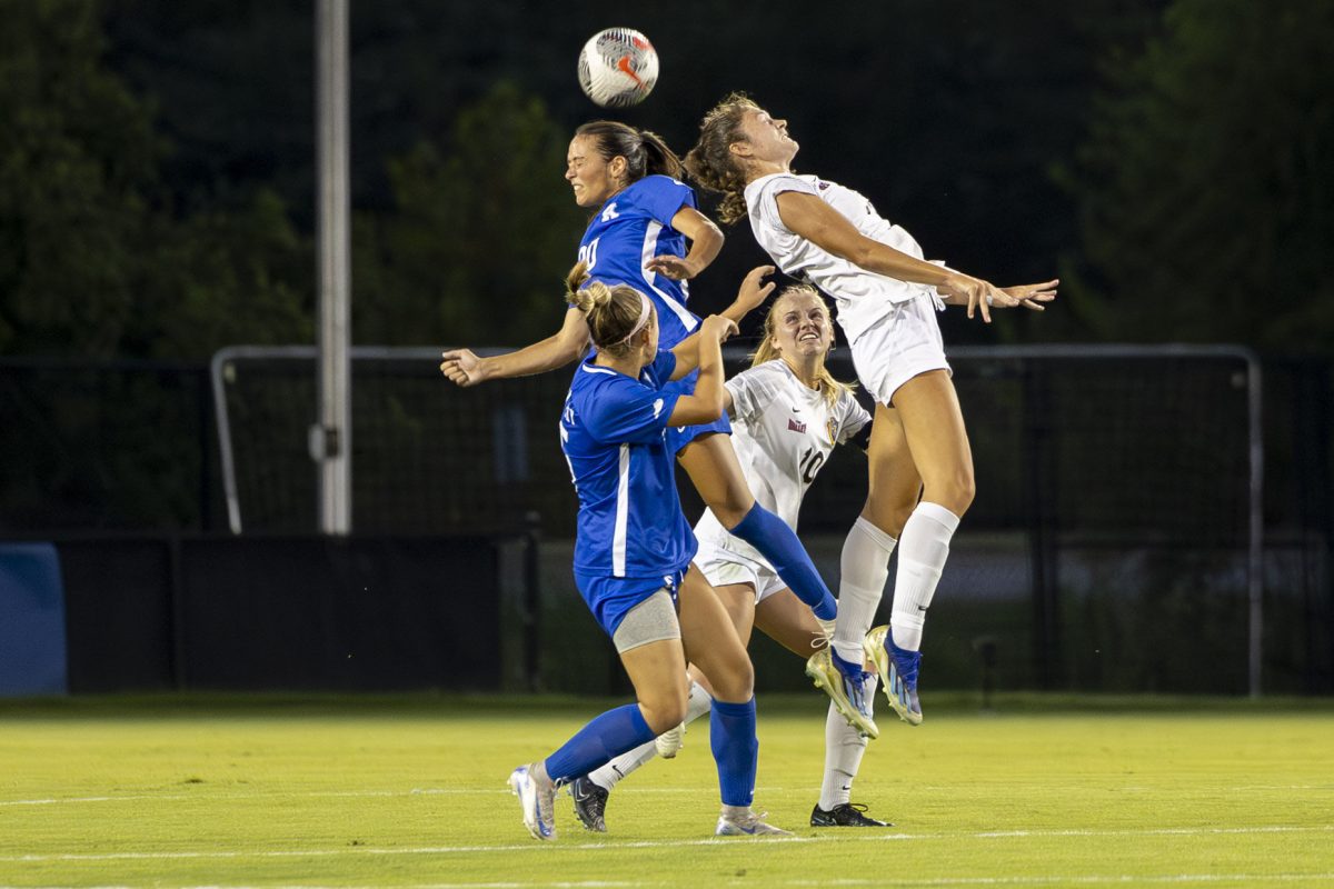 Kentucky Midfielder Catherine DeRosa heads the ball during the Kentucky vs Murray State Soccer match on Thursday, Sept. 5, 2024, at Wendell &amp; Vickie Bell Soccer Complex in Lexington, Kentucky. Kentucky defeated Murray State 1-0. Photo by Matthew Mueller | Photo Editor