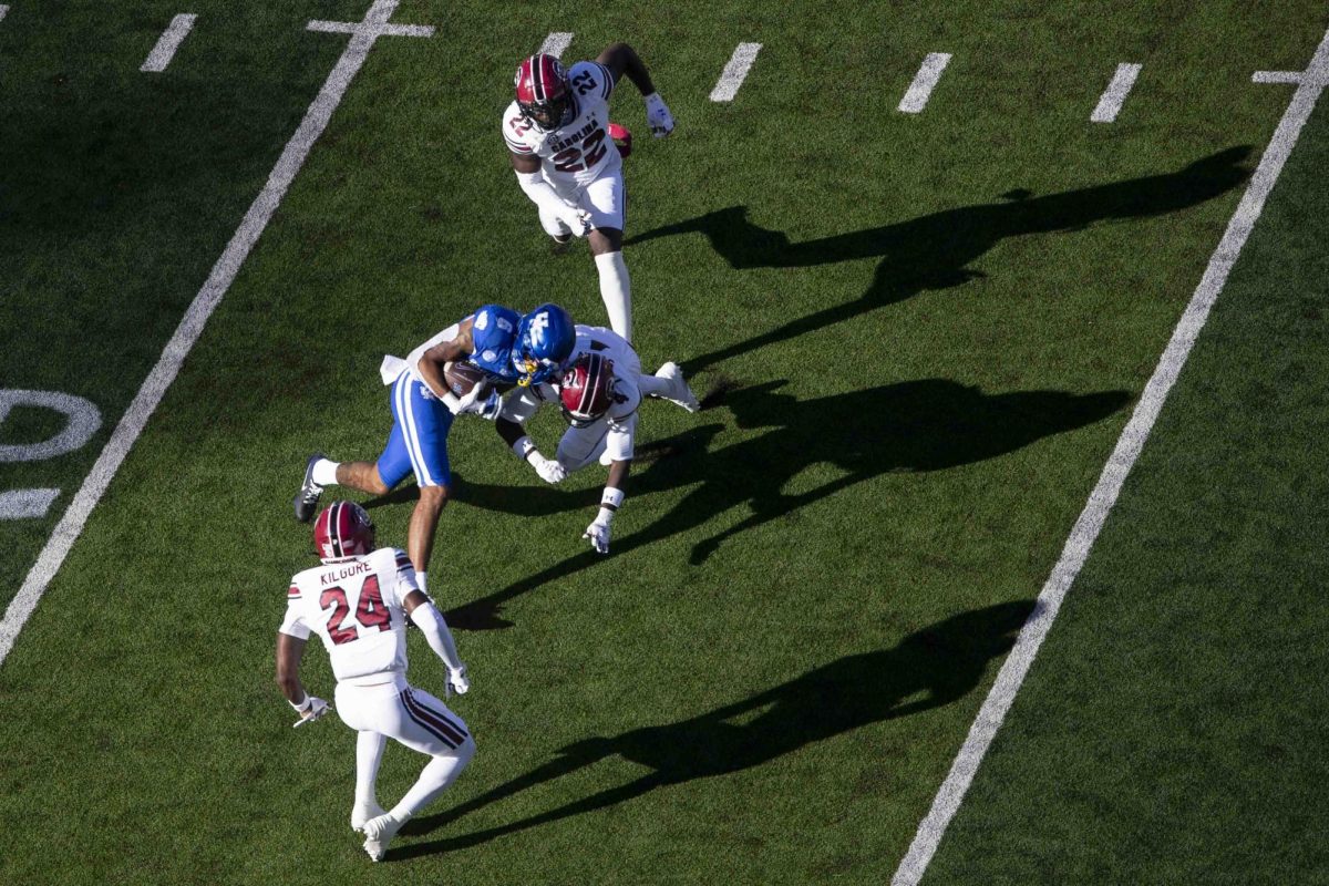 Kentucky Wildcats wide receiver Dane Key (6) collides with a defender during the game between Kentucky and South Carolina. Kentucky lost to South Carolina 31-6. Saturday, Sept. 7, 2024, at Kroger Field in Lexington, Kentucky. Photo by Matthew Mueller | Photo Editor