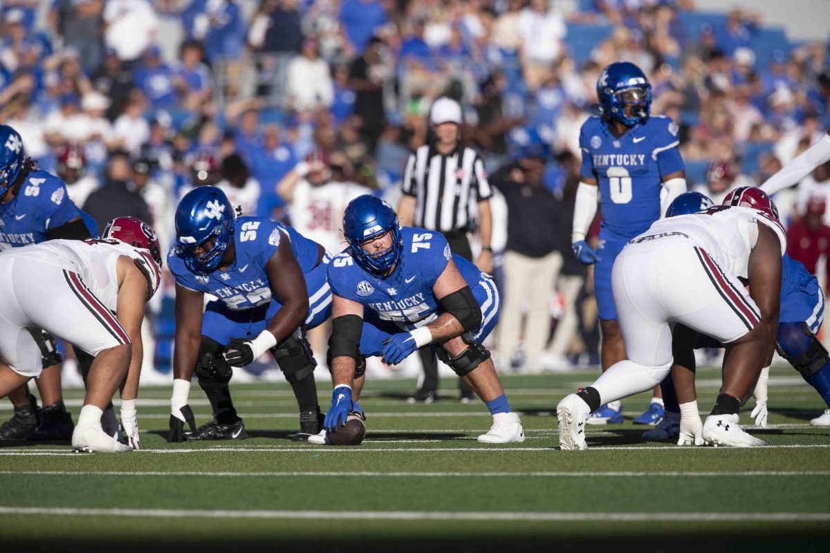 Kentucky Wildcats offensive lineman Eli Cox (75) prepares to snap the ball during the game between Kentucky and South Carolina. Kentucky lost to South Carolina 31-6. Saturday, Sept. 7, 2024, at Kroger Field in Lexington, Kentucky. Photo by Matthew Mueller | Photo Editor
