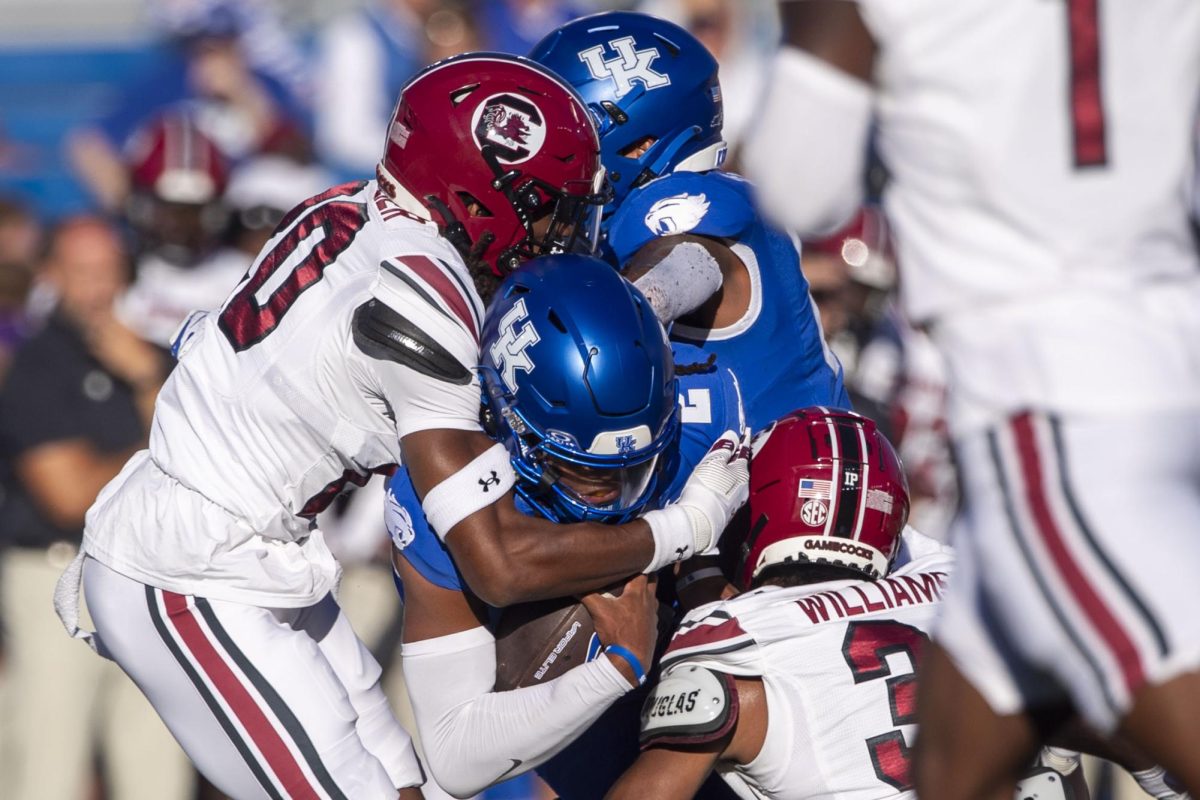 Kentucky Wildcats quarterback Gavin Wimsatt (2) tries to rush past defenders during the game between Kentucky and South Carolina. Kentucky lost to South Carolina 31-6. Saturday, Sept. 7, 2024, at Kroger Field in Lexington, Kentucky. Photo by Matthew Mueller | Photo Editor