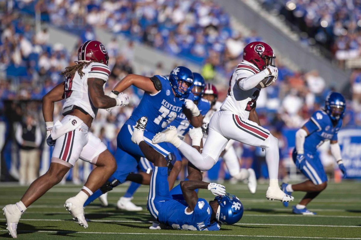 South Carolina Gamecocks Defensive Back Jalon Kilgore (24) hurdles a Kentucky defender after picking the ball off during the game between Kentucky and South Carolina. Kentucky lost to South Carolina 31-6. Saturday, Sept. 7, 2024, at Kroger Field in Lexington, Kentucky. Photo by Matthew Mueller | Photo Editor
