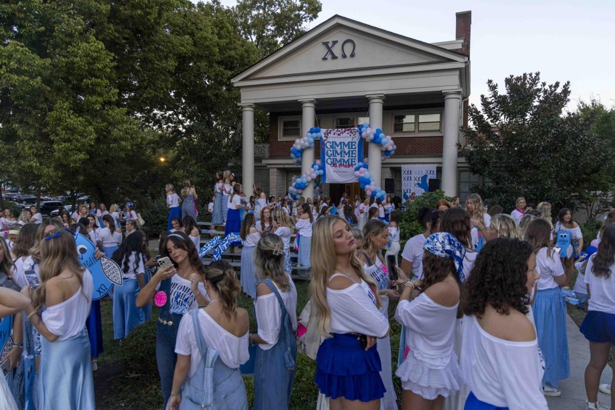 Members of Chi Omega wait for new members to arrive during bid day on Monday, Sept. 9, 2024, at Greek Row in Lexington, Kentucky. Photo by Matthew Mueller | Staff