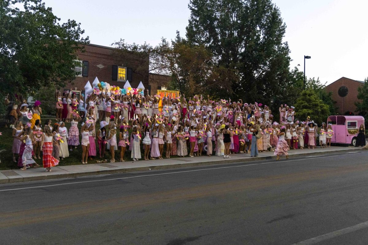 Members of Alpha Delta Pi wait outside of their house for their new members to arrive during bid day on Monday, Sept. 9, 2024, at Greek Row in Lexington, Kentucky. Photo by Matthew Mueller | Staff