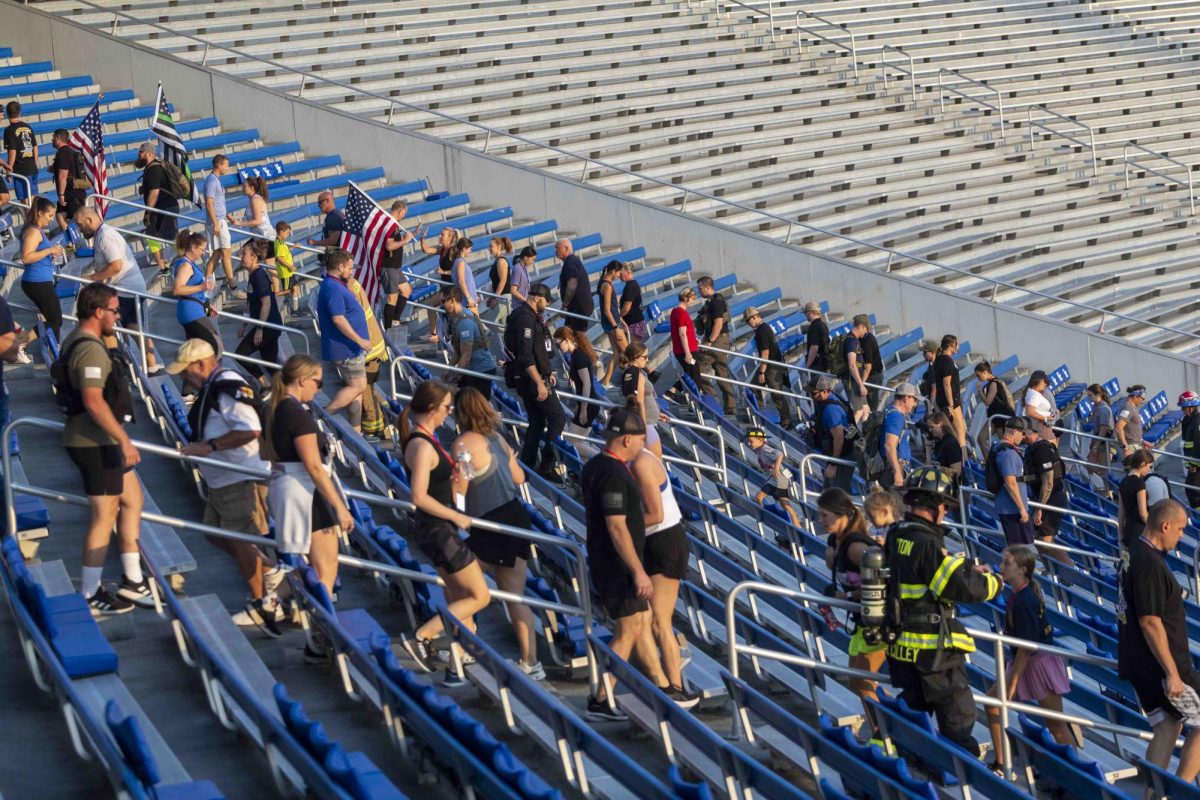 Participants start the stair climb during the 9/11 Memorial Stair Climb on Wednesday, Sept. 11, 2024, at Kroger Field in Lexington, Kentucky. Photo by Matthew Mueller | Staff