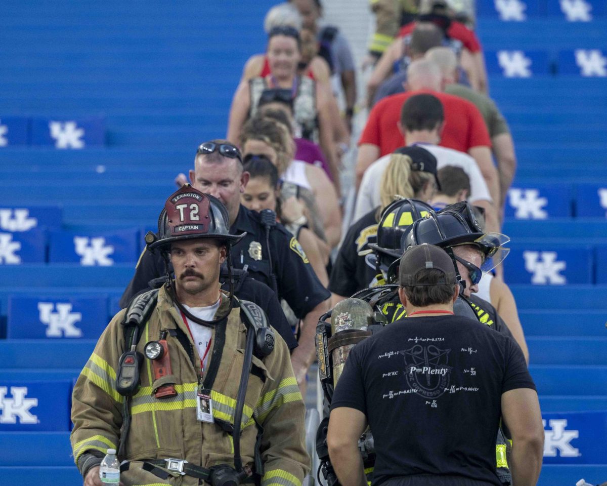 Participants climb stairs during the 9/11 Memorial Stair Climb on Wednesday, Sept. 11, 2024, at Kroger Field in Lexington, Kentucky. Photo by Matthew Mueller | Staff