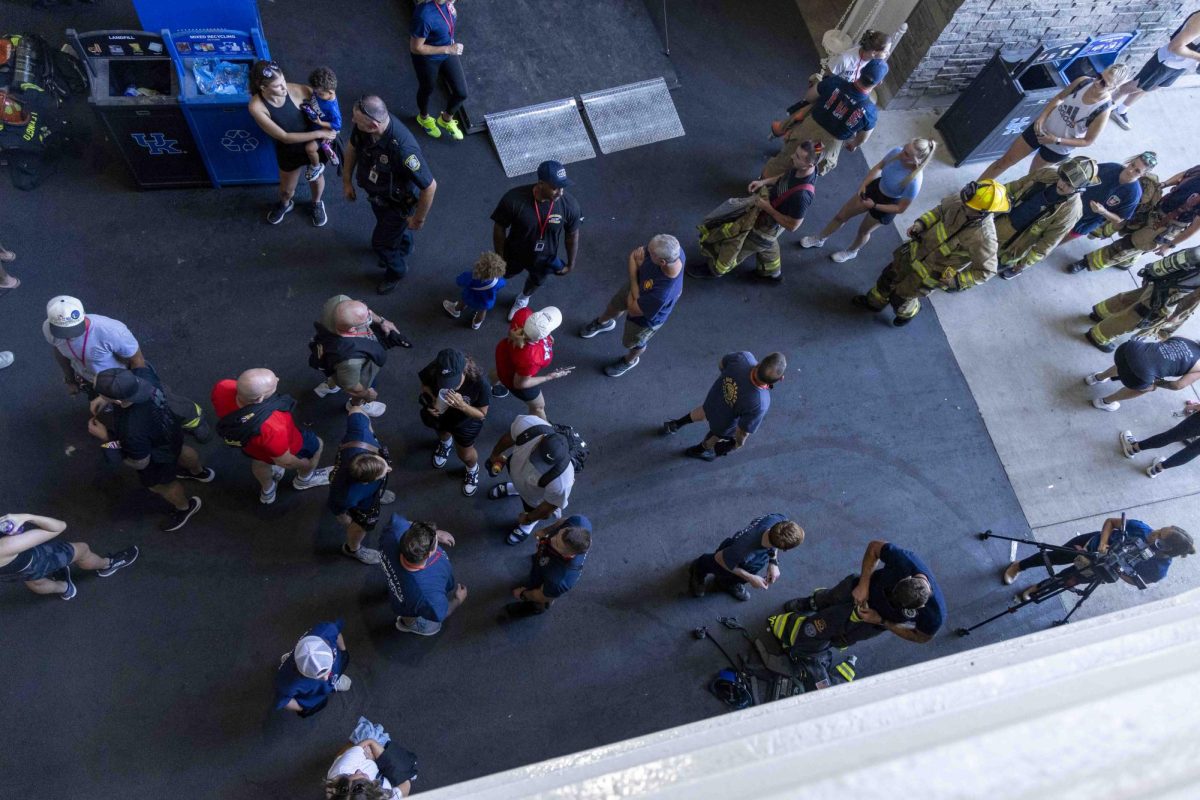 Participants arrive at Kroger Field to start the 9/11 Memorial Stair Climb on Wednesday, Sept. 11, 2024, at Kroger Field in Lexington, Kentucky. Photo by Matthew Mueller | Staff