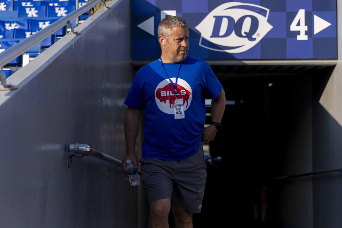 A participant walks out to the stadium before the 9/11 Memorial Stair Climb on Wednesday, Sept. 11, 2024, at Kroger Field in Lexington, Kentucky. Photo by Matthew Mueller | Staff