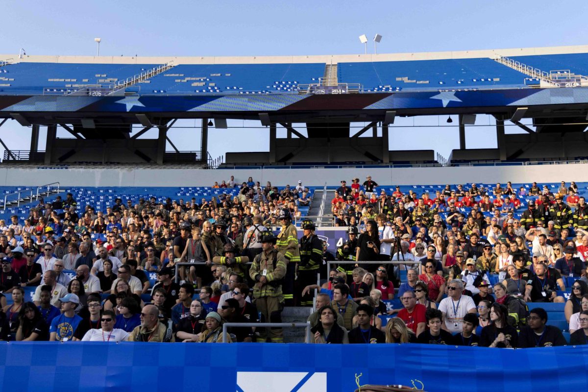 Firefighters and community members gather at Kroger Field to start the 9/11 Memorial Stair Climb on Wednesday, Sept. 11, 2024, at Kroger Field in Lexington, Kentucky. Photo by Matthew Mueller | Staff